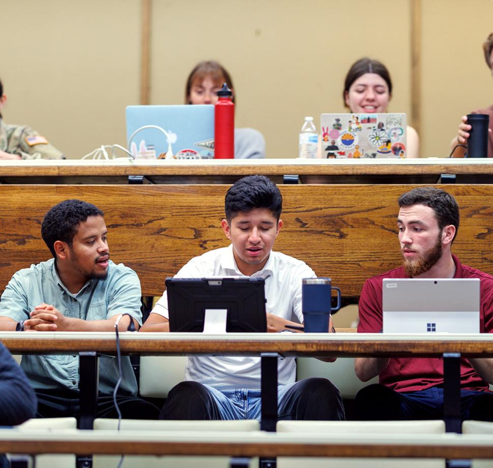 three students in class